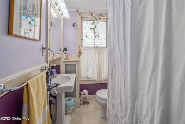 8 Front St, Schenectady, NY 12305 - bathroom featuring toilet and tile patterned flooring