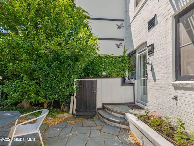 8 Front St, Schenectady, NY 12305 - view of patio featuring a gate