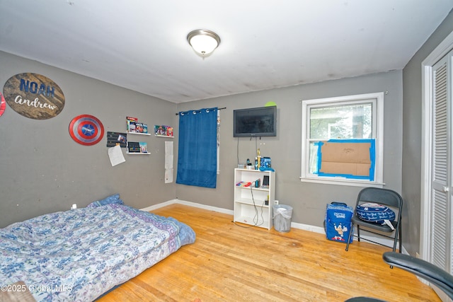 1101 Manas Dr, Schenectady, NY 12303 - bedroom with wood finished floors and baseboards