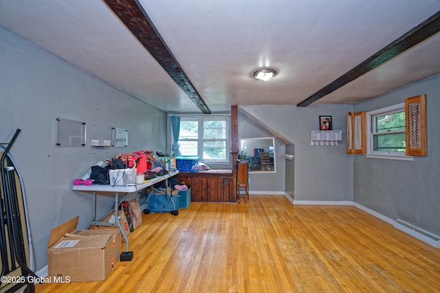 1101 Manas Dr, Schenectady, NY 12303 - office featuring wood finished floors, a baseboard radiator, and beam ceiling
