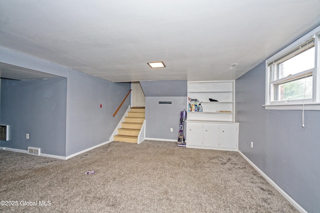 1101 Manas Dr, Schenectady, NY 12303 - below grade area with carpet and stairway