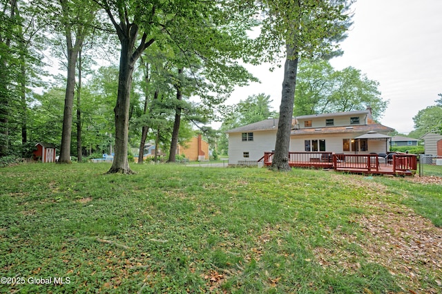 1101 Manas Dr, Schenectady, NY 12303 - view of yard featuring a storage shed and a deck