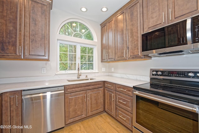 614 Apex Ln, Troy, NY 12182 - kitchen with stainless steel appliances, light wood-type flooring, and recessed lighting