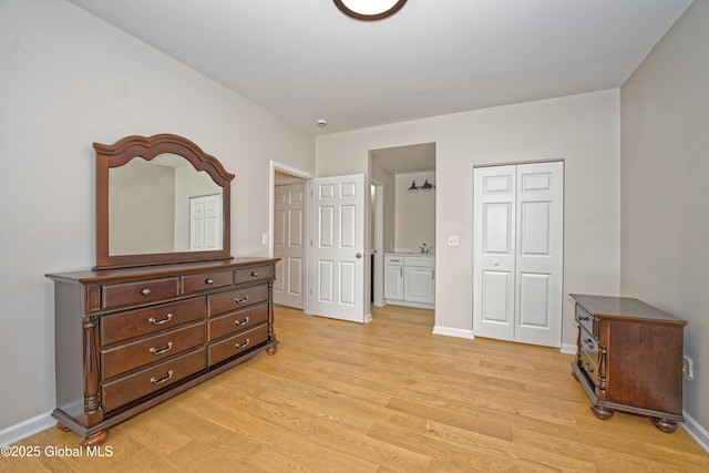 614 Apex Ln, Troy, NY 12182 - bedroom with light wood-style floors and a closet