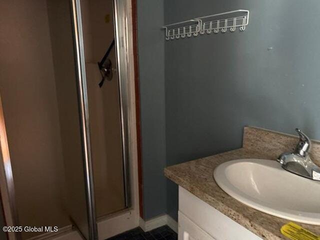 21 Crandall St, Glens Falls, NY 12801 - bathroom featuring a stall shower and vanity