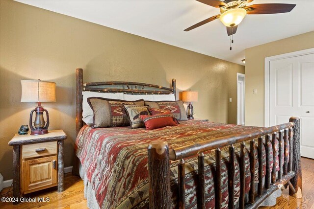 15 Green Harbour Ln, Lake George, NY 12845 - bedroom with light wood finished floors and ceiling fan