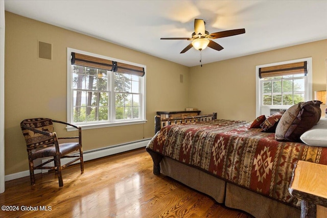 15 Green Harbour Ln, Lake George, NY 12845 - bedroom featuring multiple windows, wood finished floors, and ceiling fan