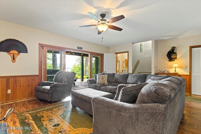 15 Green Harbour Ln, Lake George, NY 12845 - living area featuring wainscoting, wood finished floors, a ceiling fan, and wooden walls