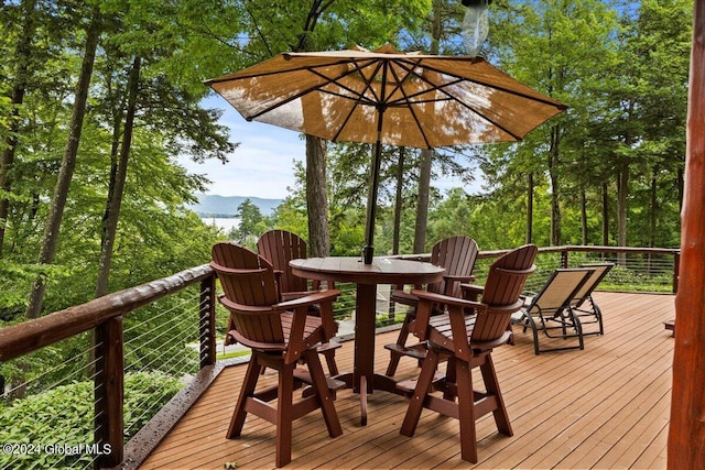15 Green Harbour Ln, Lake George, NY 12845 - wooden terrace with outdoor dining area