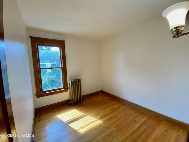 8 Mapleridge Ave, Albany, NY 12209 - spare room with radiator and wood finished floors