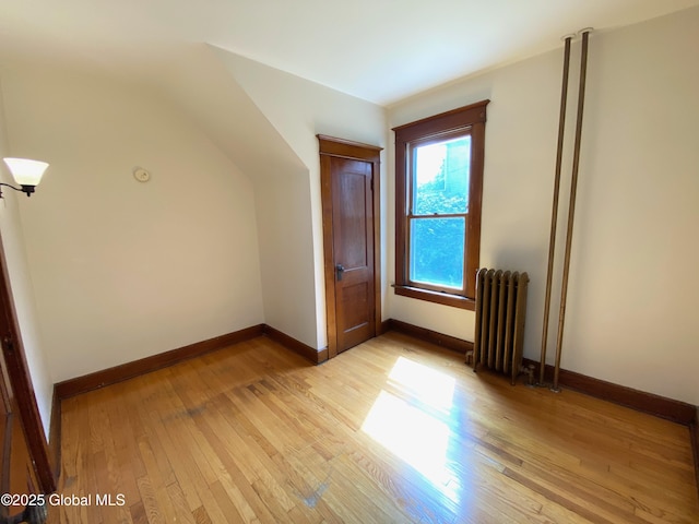 8 Mapleridge Ave, Albany, NY 12209 - bonus room featuring radiator and light wood finished floors