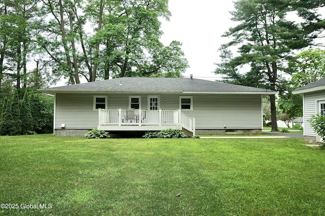 171 Consaul Rd, Colonie, NY 12205 - back of property with a wooden deck and a lawn