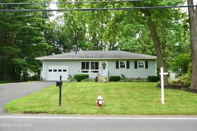 171 Consaul Rd, Colonie, NY 12205 - ranch-style house featuring a garage, asphalt driveway, and a front yard