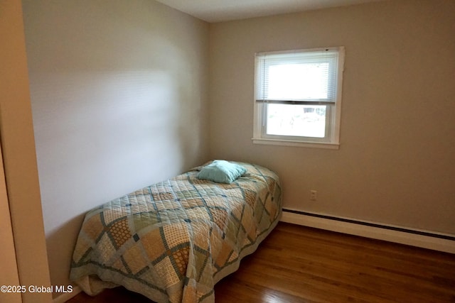 171 Consaul Rd, Colonie, NY 12205 - bedroom with baseboard heating and wood finished floors