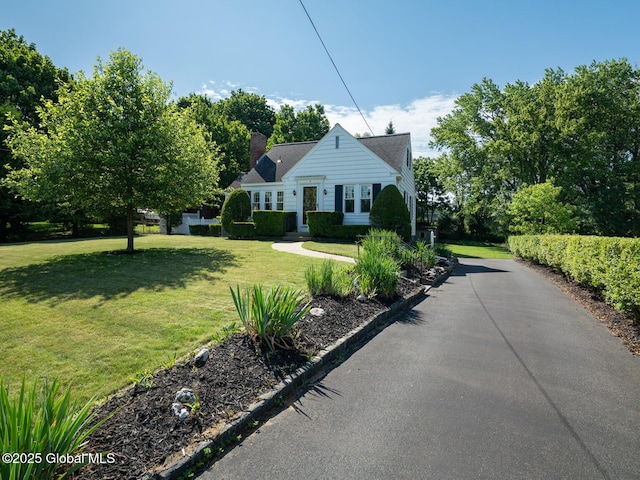 2 Arthur Rd, Colonie, NY 12110 - bungalow-style home with a chimney and a front lawn