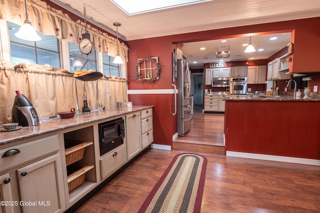19 Meadow Rd, Hudson Falls, NY 12839 - kitchen featuring stainless steel appliances, dark wood-type flooring, wainscoting, pendant lighting, and crown molding