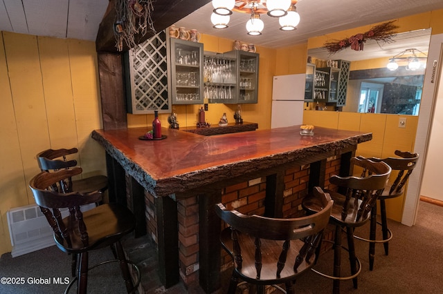 19 Meadow Rd, Hudson Falls, NY 12839 - indoor bar featuring freestanding refrigerator, carpet flooring, and a chandelier