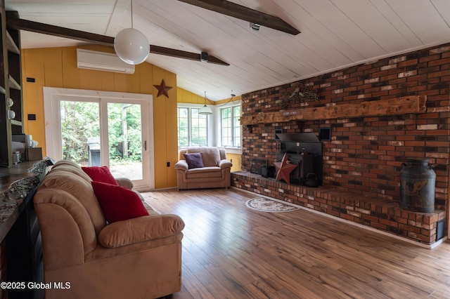 19 Meadow Rd, Hudson Falls, NY 12839 - living area featuring a wall unit AC, wood-type flooring, and wooden walls