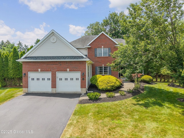 16 Callaway Cir, Colonie, NY 12211 - view of front of home with asphalt driveway, an attached garage, a front yard, brick siding, and a shingled roof