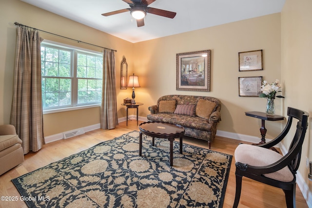 16 Callaway Cir, Colonie, NY 12211 - living room featuring a ceiling fan and wood finished floors