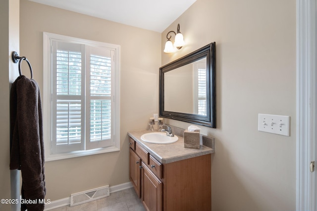 16 Callaway Cir, Colonie, NY 12211 - bathroom with healthy amount of natural light, vanity, and tile patterned floors