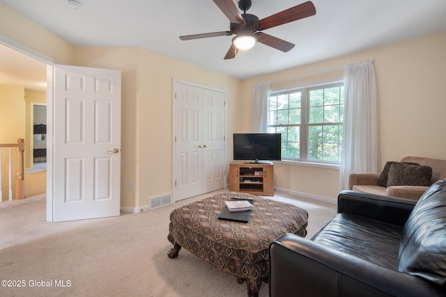 16 Callaway Cir, Colonie, NY 12211 - living room featuring light colored carpet and a ceiling fan