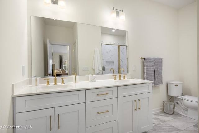 10A Idared Ln, Halfmoon, NY 12065 - ensuite bathroom with double vanity, a marble finish shower, and marble finish floors