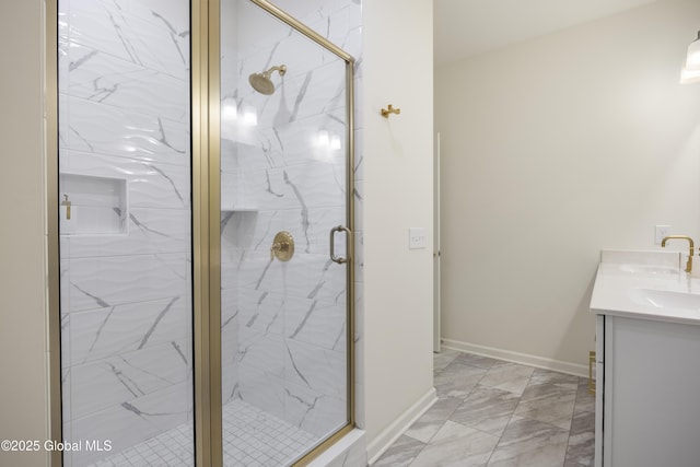 10A Idared Ln, Halfmoon, NY 12065 - bathroom featuring double vanity, a marble finish shower, and marble finish flooring
