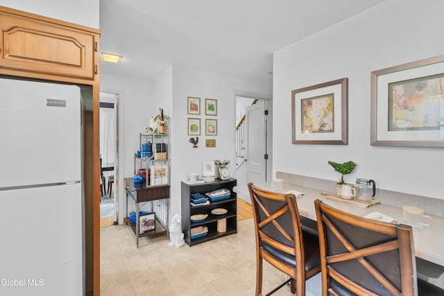 1101 Ardsley Rd, Schenectady, NY 12308 - dining room with stairs and light tile patterned floors