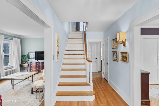 1101 Ardsley Rd, Schenectady, NY 12308 - stairs with wood finished floors and radiator