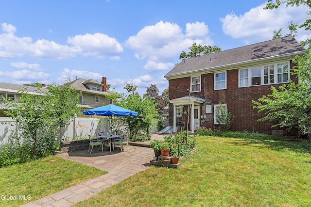 1101 Ardsley Rd, Schenectady, NY 12308 - rear view of property featuring a patio area and brick siding