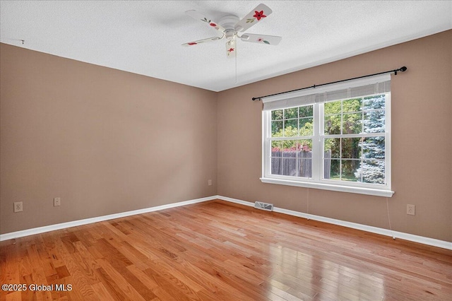 13 Hyland Cir, Troy, NY 12182 - unfurnished room featuring a ceiling fan, light wood-type flooring, and a textured ceiling