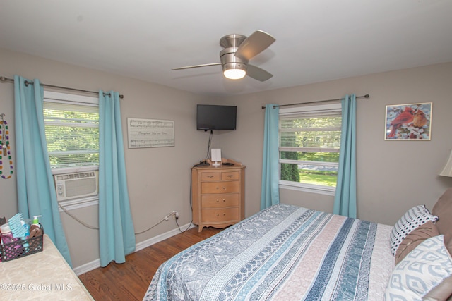 33 Woodside Dr, Glenville, NY 12302 - bedroom with dark wood-style floors, cooling unit, and a ceiling fan