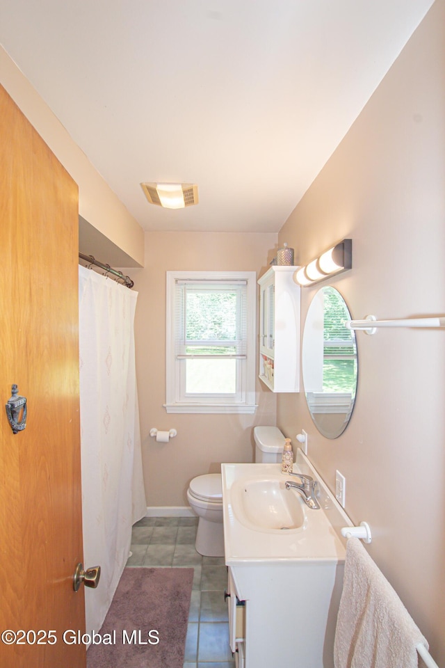 33 Woodside Dr, Glenville, NY 12302 - full bath featuring vanity, tile patterned flooring, and a shower with shower curtain