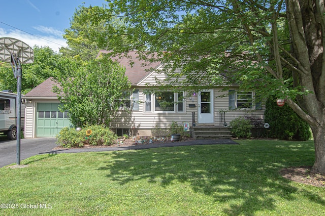 33 Woodside Dr, Glenville, NY 12302 - view of front of house featuring asphalt driveway, a garage, a front yard, and a shingled roof