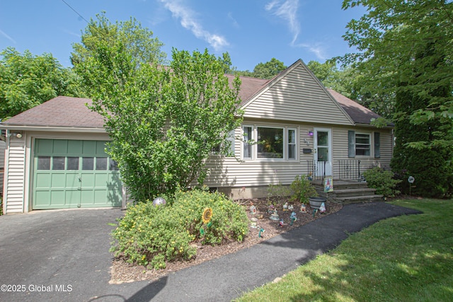 33 Woodside Dr, Glenville, NY 12302 - view of front facade with an attached garage, driveway, and a shingled roof