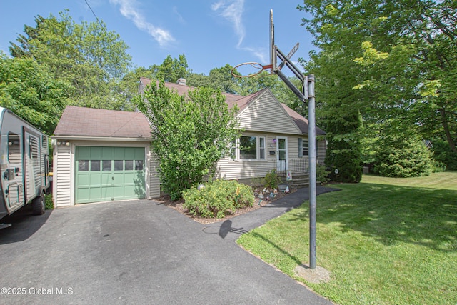 33 Woodside Dr, Glenville, NY 12302 - view of front of house featuring a front lawn, driveway, roof with shingles, a chimney, and a detached garage