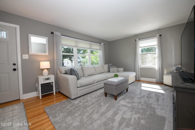 23 Mcmillen Pl, Bethlehem, NY 12054 - living area with light wood finished floors and baseboards
