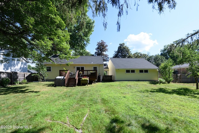 23 Mcmillen Pl, Bethlehem, NY 12054 - back of property with a wooden deck and a fenced backyard