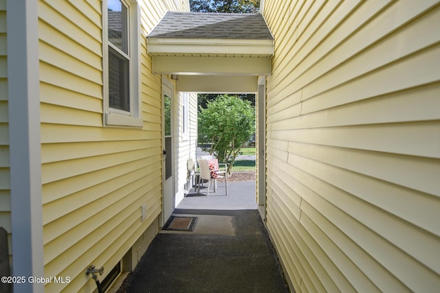 23 Mcmillen Pl, Bethlehem, NY 12054 - entrance to property featuring roof with shingles