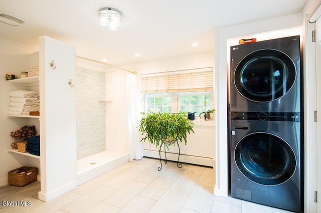 1264 Pilot Knob Rd, Fort Ann, NY 12844 - laundry room with stacked washer / drying machine, a baseboard heating unit, recessed lighting, and light tile patterned floors