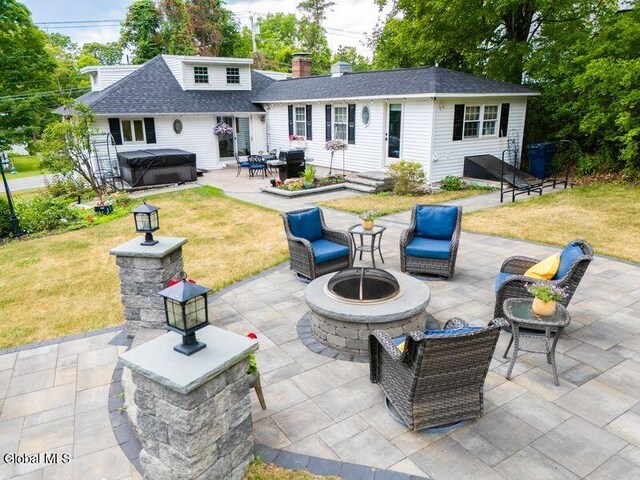 1264 Pilot Knob Rd, Fort Ann, NY 12844 - view of patio / terrace with a hot tub, a fire pit, and area for grilling