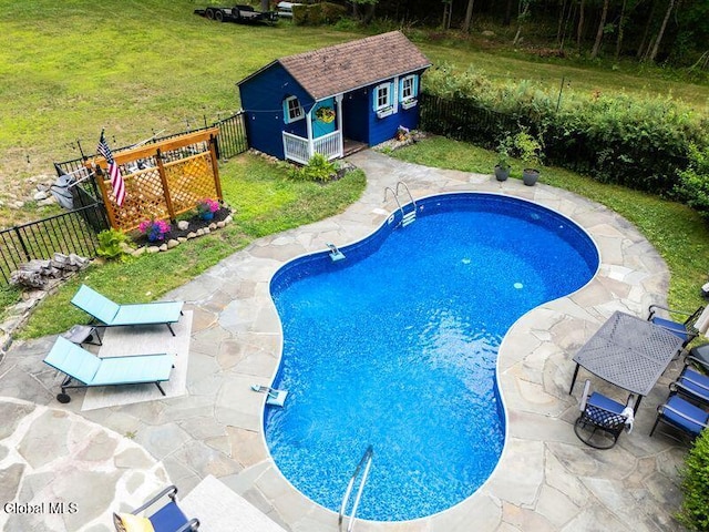 1264 Pilot Knob Rd, Fort Ann, NY 12844 - view of swimming pool featuring an outbuilding, a fenced backyard, a patio, and an exterior structure