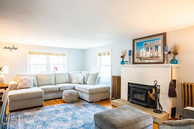 1264 Pilot Knob Rd, Fort Ann, NY 12844 - living area with radiator heating unit and wood finished floors