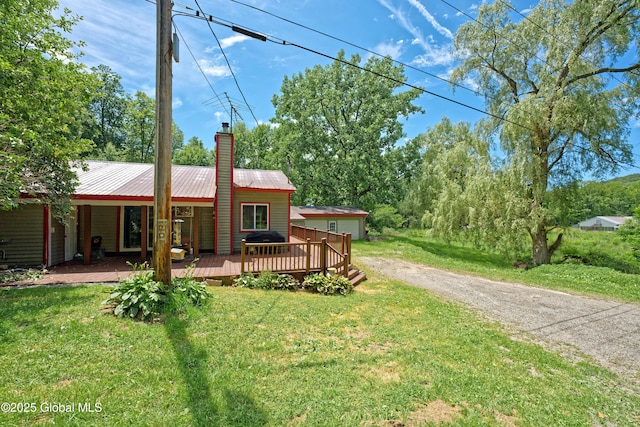 962 Camden Valley Rd, Salem, NY 12873 - back of house with a chimney, a lawn, a metal roof, and a wooden deck