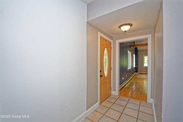 962 Camden Valley Rd, Salem, NY 12873 - corridor with a baseboard radiator, a baseboard heating unit, and light tile patterned floors