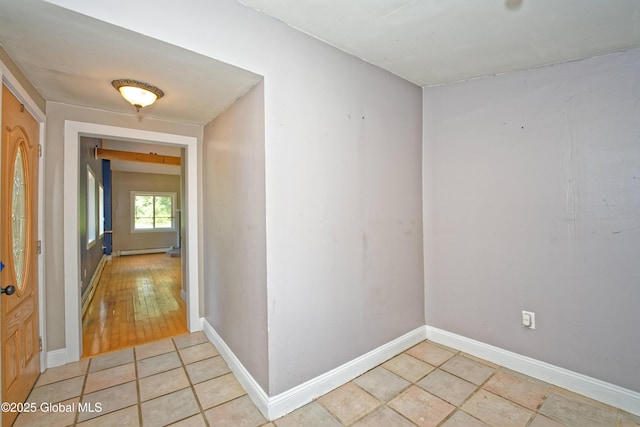 962 Camden Valley Rd, Salem, NY 12873 - corridor with light tile patterned floors and a baseboard radiator