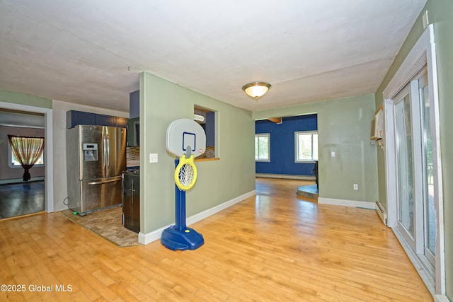 962 Camden Valley Rd, Salem, NY 12873 - unfurnished room with light wood-style flooring and a baseboard radiator