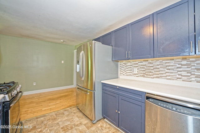 962 Camden Valley Rd, Salem, NY 12873 - kitchen with stainless steel appliances, tasteful backsplash, and light countertops