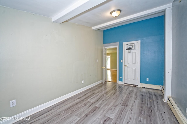 962 Camden Valley Rd, Salem, NY 12873 - unfurnished room with a baseboard heating unit, beamed ceiling, and wood finished floors
